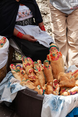 Group of bread dolls decorated with colorful colors to visit the deceased on Saints' Day in Otavalo Ecuador