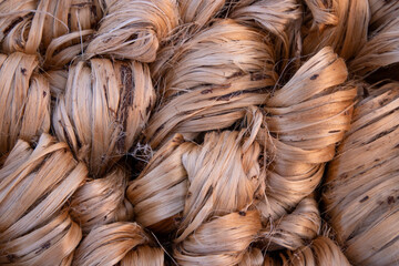 Thick Golden bundle of raw jute fiber abstract Pattern Texture Can be used as a Background wallpaper