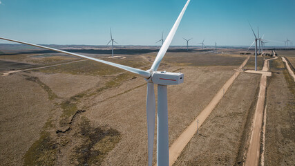 Windmill park in the countryside on a sunny day. Wind turbines in Argentina