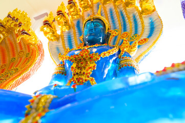 Translucent blue Buddha statue