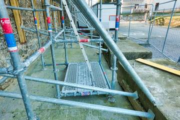 Metal girder extensive scaffolding providing platforms for stage structure support