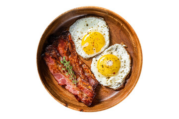 Traditional English breakfast with fried eggs and bacon in wooden plate. Transparent background. Isolated