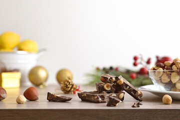 Chocolate portions on christmas table and white isolated background