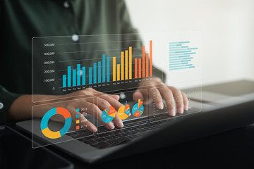 Businesswoman analyzing company's business financial balance sheet working with digital augmented...