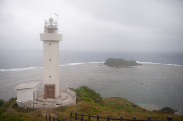 Fototapeta na wymiar lighthouse on the coast,平久保崎,沖縄,日本