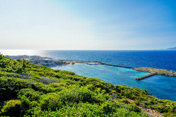 View of the landscape and the Mediterranean Sea from a mountain on the Greek island of Kos.	