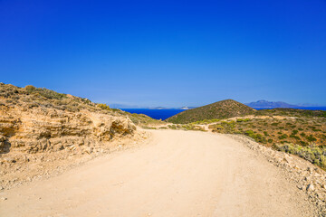 View of the landscape and the Mediterranean Sea from a mountain on the Greek island of Kos.	