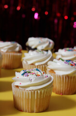 Cupcakes on Table at Party With Bokeh Background