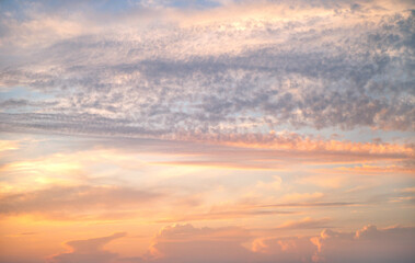 blue sky with clouds, pink yellow sun sunset, background


