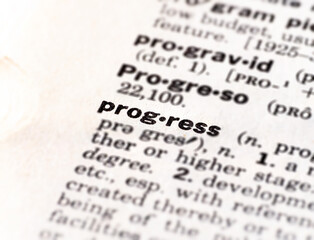 Closeup of the definition of the word progress