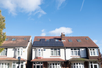 Rooftop solar panels on residential houses in central west London