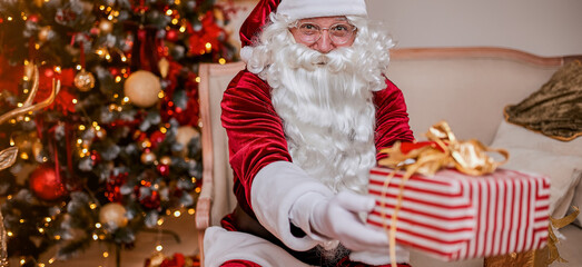 Santa Claus brought gifts to children. New year and Merry Christmas concept. Advertising banner