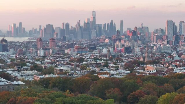 Aerial view of The New York City skyline at sunset. Shot during The Autumn of 2023 in 4k.