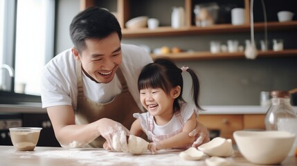Obraz na płótnie Canvas Asian happy family stay at home in kitchen spend time together baking bakery and foods.little kid with father laughing, enjoy parenting activity relationship in house.