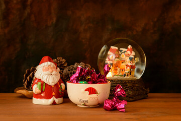 Christmas still life with figures and sweets.
