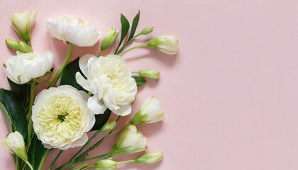 Obraz na płótnie Canvas Flowers on light pink background
