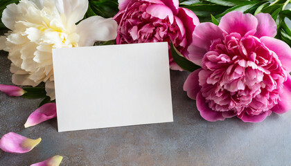 Greeting or invitation card and peony flowers