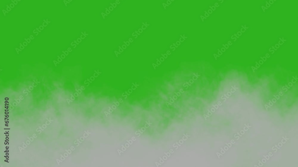 Wall mural horizontally and vertically moving smoke. moving clouds in slow speed on green background.
