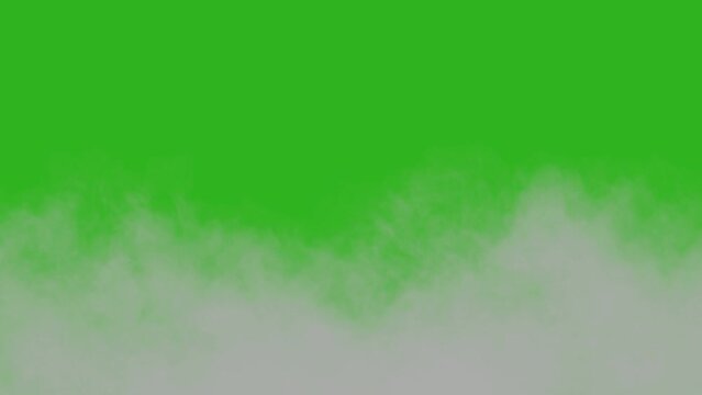  Horizontally and vertically moving smoke. moving clouds in slow speed on green background. 