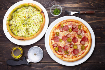 tasty pizza on the wooden background