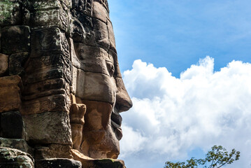 Fototapeta na wymiar Exterior of the Bayon temple with gargantuan faces, Angkor Thom, Angkor, Cambodia, Asia