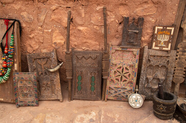 Old Moroccan carved interior wooden doors in street trade in Ait BenHaddou, Morocco