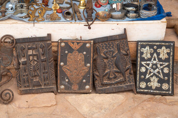 Old Moroccan carved wooden doors and jewels in street trade in Ait Ben Haddou, Morocco