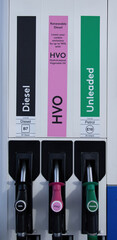 vehicle fuel pumps showing new hydro treated vegetable oil HVO bio diesel fuel
