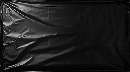 Foto op Plexiglas Polythene wraps for an overlay effect on black background. Wrinkled packaging © Alexander Kurilchik