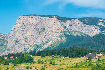 Fototapeta na wymiar Mountains and houses in Zabljak. Montenegro