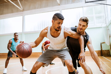 Young basketball players in action at the gym