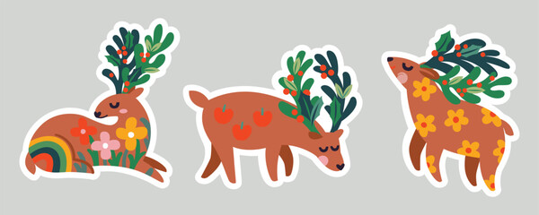 Obraz na płótnie Canvas Stickers of three cute Christmas deers with horns mistletoe
