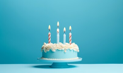 birthday cake with  five 5 candles on pastel blue background with copyspace