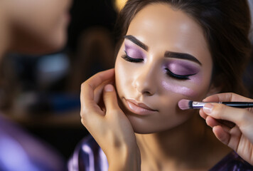 woman in the violet artistic make up studio applying makeup to the wrist, violet and navy, selective focus,