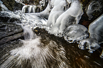 Frozen stream and ice in various forms. HDR Image (High Dynamic Range).