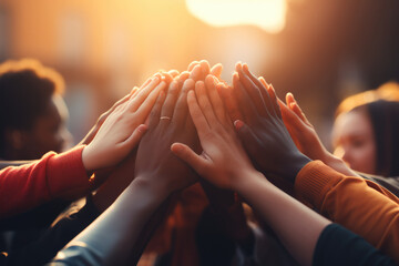 Diverse people joining their hands, Symbol of unity, Community and solidarity, Close up on hands. - obrazy, fototapety, plakaty