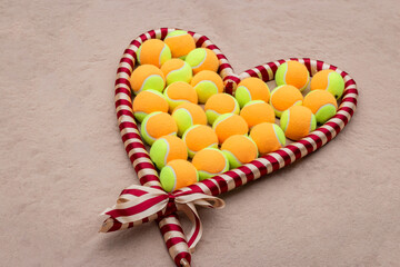 Christmas Heart of Beach Tennis Balls - Festive Spirit on Sand