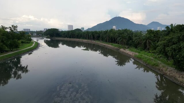 Aerial view dark muddy river Sungai Juru