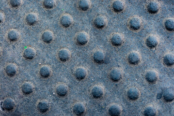 Pavement concrete grunge texture pattern optical illusion holes or round bumps background