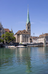 Fototapeta na wymiar Fraumuenster Church with a view over Lake Zurich into the old town of Zurich