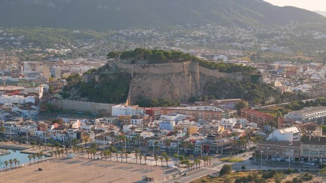 Aerial drone view of the coastal town named Denia in the Costa Blanca, Spain