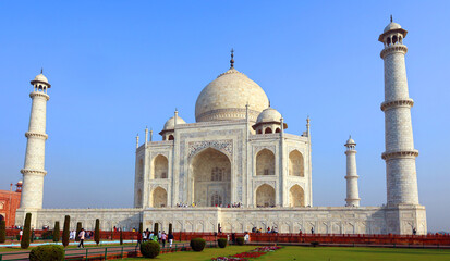 Fototapeta premium The Taj Mahal at sunrise is an ivory-white marble mausoleum on the right bank of the river Yamuna in Agra 