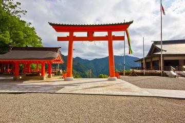 Zelfklevend Fotobehang the red temple of japan with torii gate  © frabimbo
