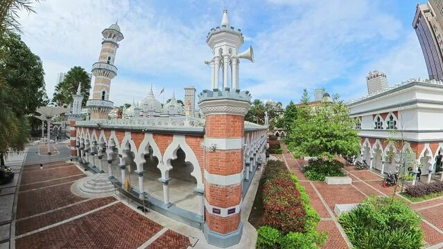 historic Sultan Abdul Samad Jamek Mosque in Kuala Lumpur, Malaysia. It stands proudly at meeting point of Gombak and Klang rivers. Constructed in 1909 by British architect Arthur Benison Hubback.