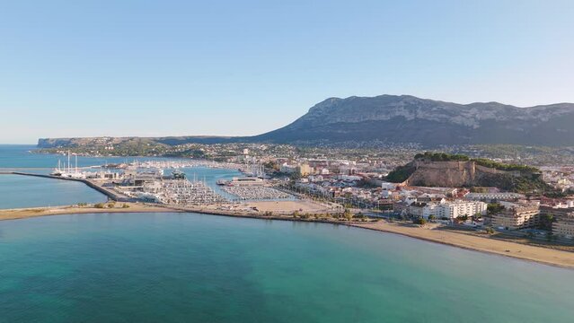Aerial drone view of the coastal town named Denia in the Costa Blanca, Spain