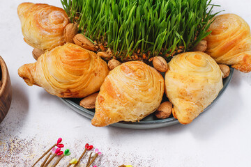 Traditional Azerbaijan holiday Novruz background with green semeni,traditional azerbaijan...
