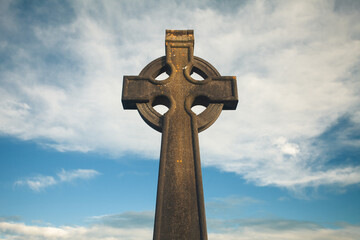 Irish Culture, Travel concept. Stone monument of Christian Cross in Bruff, County Limerick,...