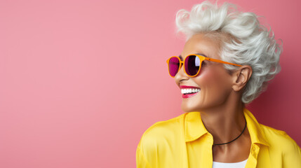 Stylish elder Caucasian woman wearing sunglasses with copy space