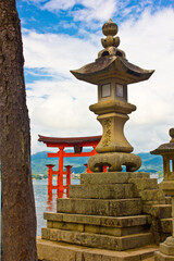 ancient torii in the island of miyajima in japan
