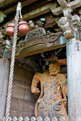 staute in a temple in myiajima in japan